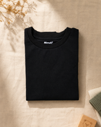 Camp Trail black kids graphic t-shirt, folded flat lay showing fabric detail