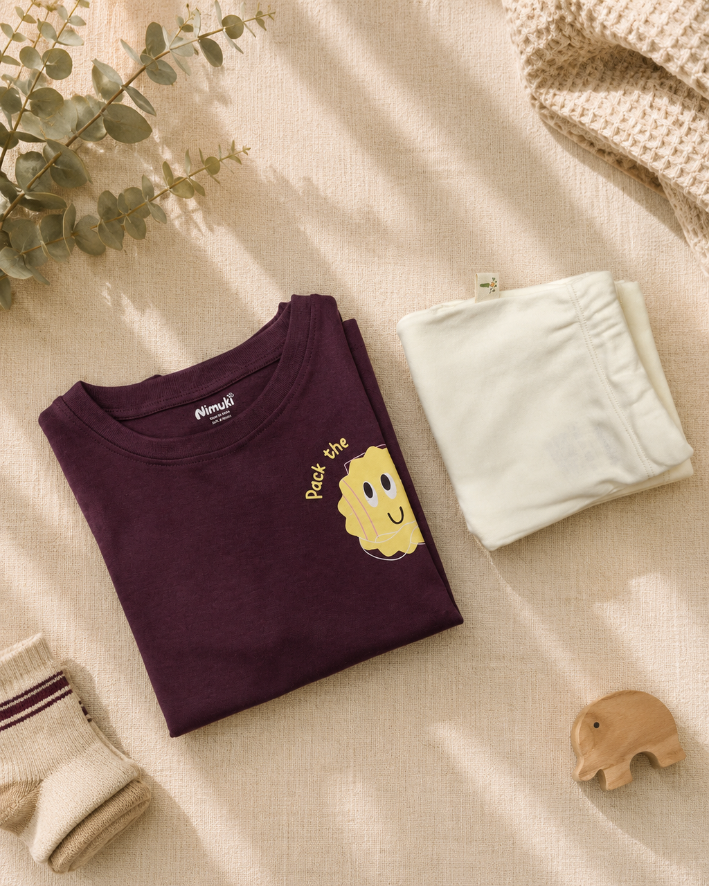Coffee Brown Pocket Sunshine kids coord set with cream shorts, folded flat lay showing fabric detail