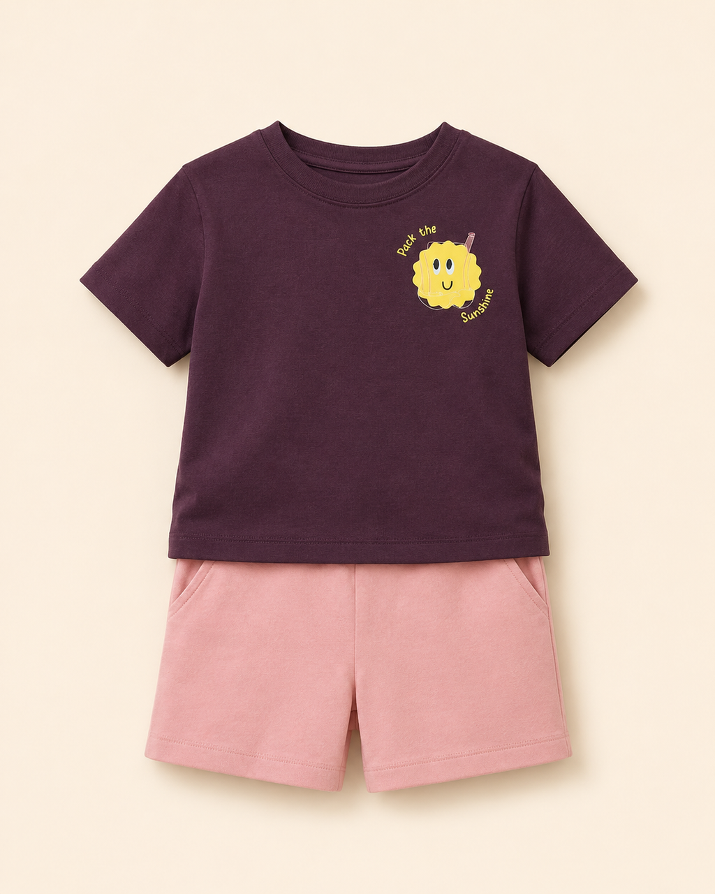 Coffee Brown Pocket Sunshine kids coord set with peach shorts, laid flat front view