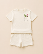 Cream Pocket Discovery kids coord set with cream shorts, laid flat front view