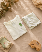 Cream Pocket Discovery kids coord set with cream shorts, folded flat lay showing fabric detail