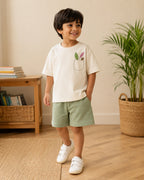 Cream Pocket Discovery kids coord set with sage green shorts, full outfit front view