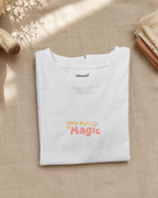 Little Puff of Magic white kids graphic t-shirt, folded flat lay showing fabric detail