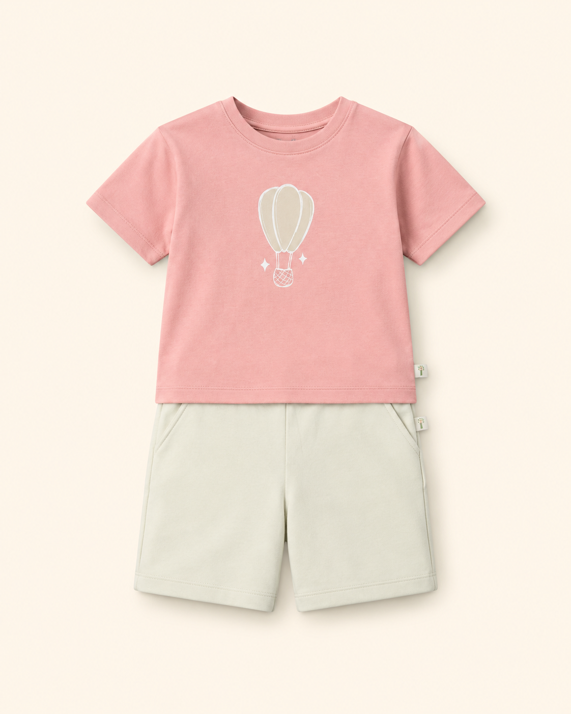 Peach Hot Air Balloon kids coord set with cream shorts, laid flat front view