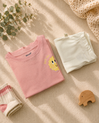 Peach Pocket Sunshine kids coord set with cream shorts, folded flat lay showing fabric detail