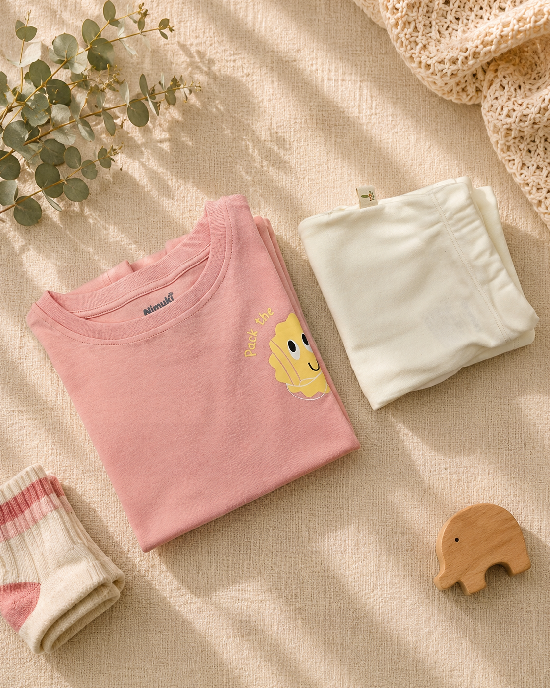 Peach Pocket Sunshine kids coord set with cream shorts, folded flat lay showing fabric detail