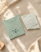 Sage Green Planet Explorer kids coord set with cream shorts, folded flat lay showing fabric detail