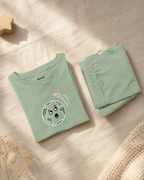 Sage Green Planet Explorer kids coord set, folded flat lay showing fabric detail
