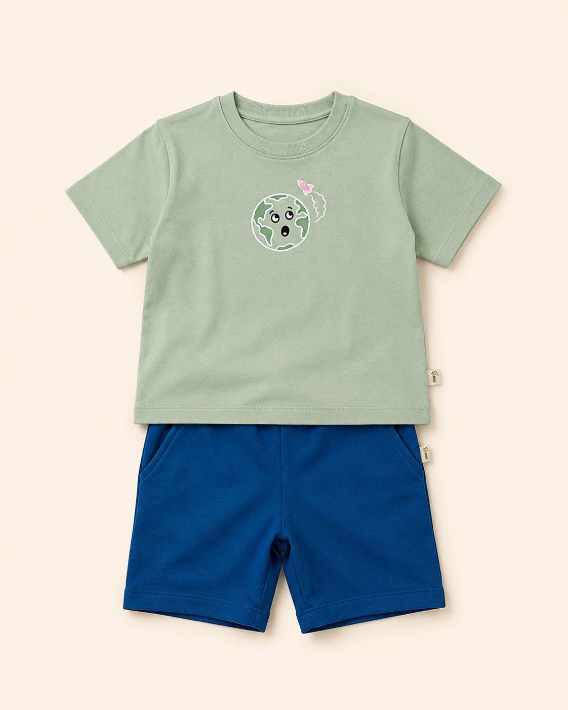 Sage Green Planet Explorer kids coord set with teal blue shorts, laid flat front view