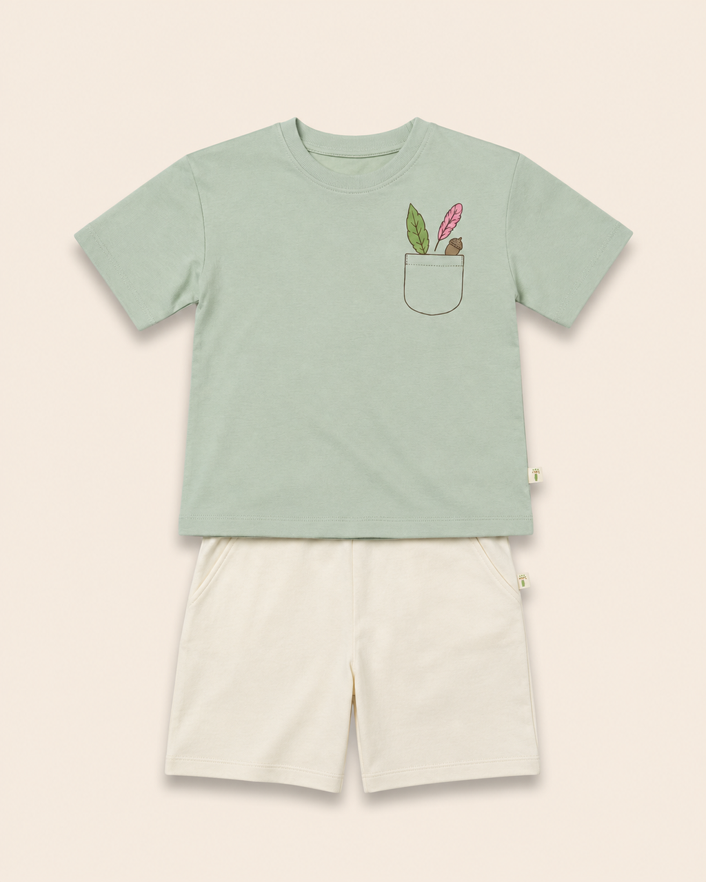 Sage Green Pocket Discovery kids coord set with cream shorts, laid flat front view