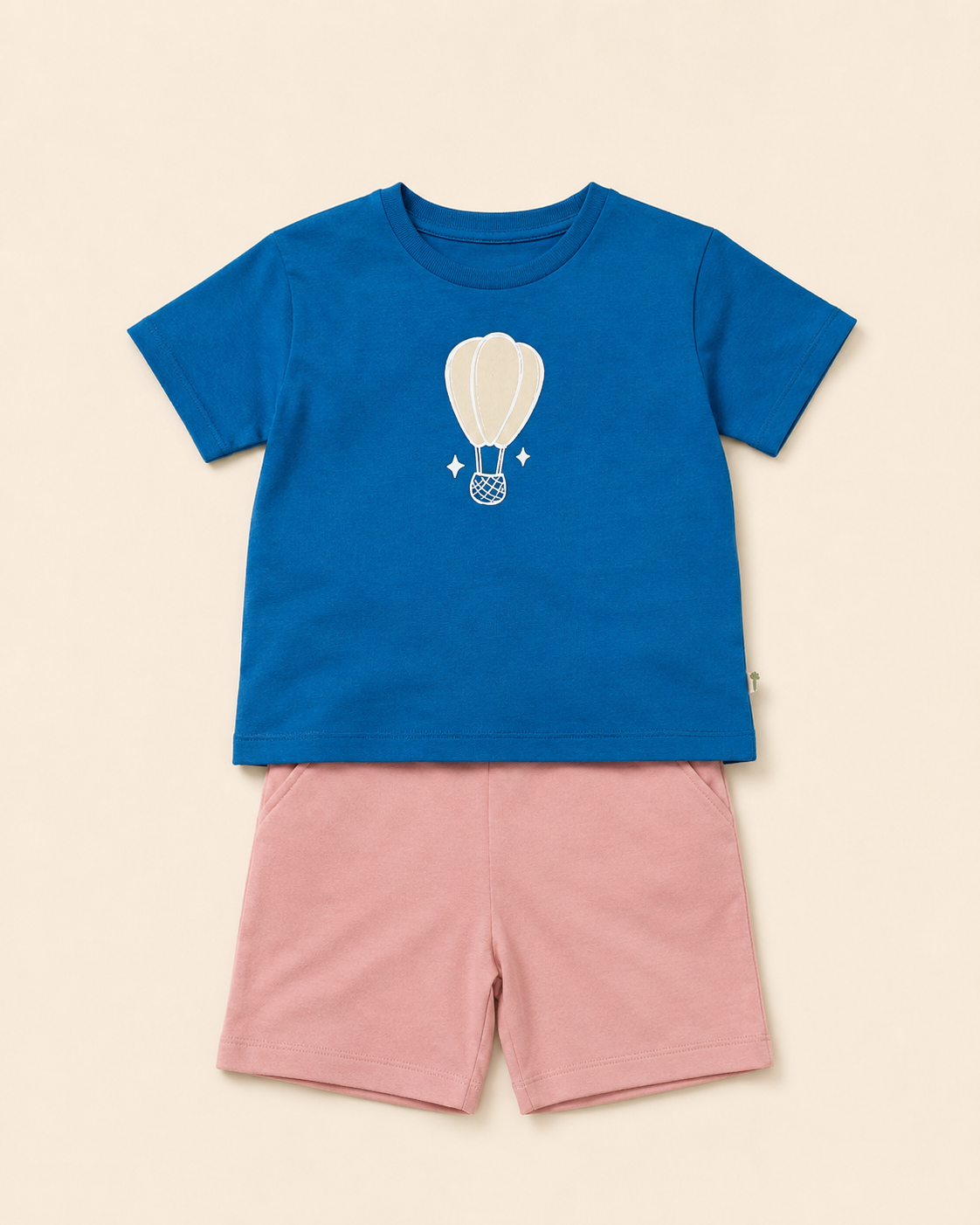 Teal Blue Hot Air Balloon kids coord set with peach shorts, laid flat front view