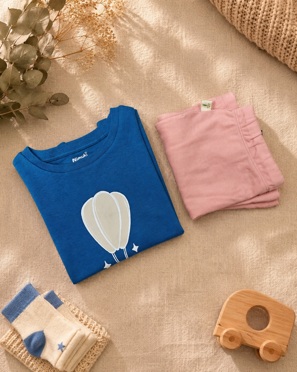 Teal Blue Hot Air Balloon kids coord set with peach shorts, folded flat lay showing fabric detail
