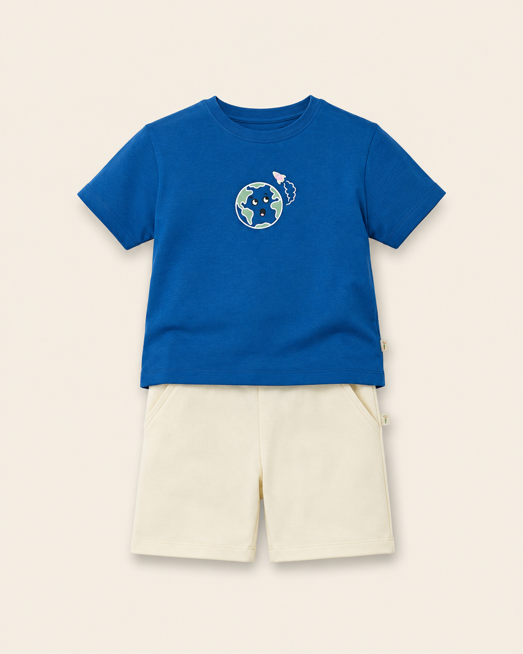 Teal Blue Planet Explorer kids coord set with cream shorts, laid flat front view