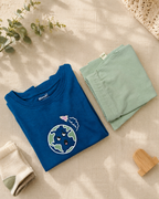 Teal Blue Planet Explorer kids coord set with sage green shorts, folded flat lay showing fabric detail