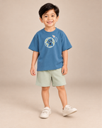Teal Blue Planet Explorer Kids Coord Set with Sage Green Shorts — Model shot
